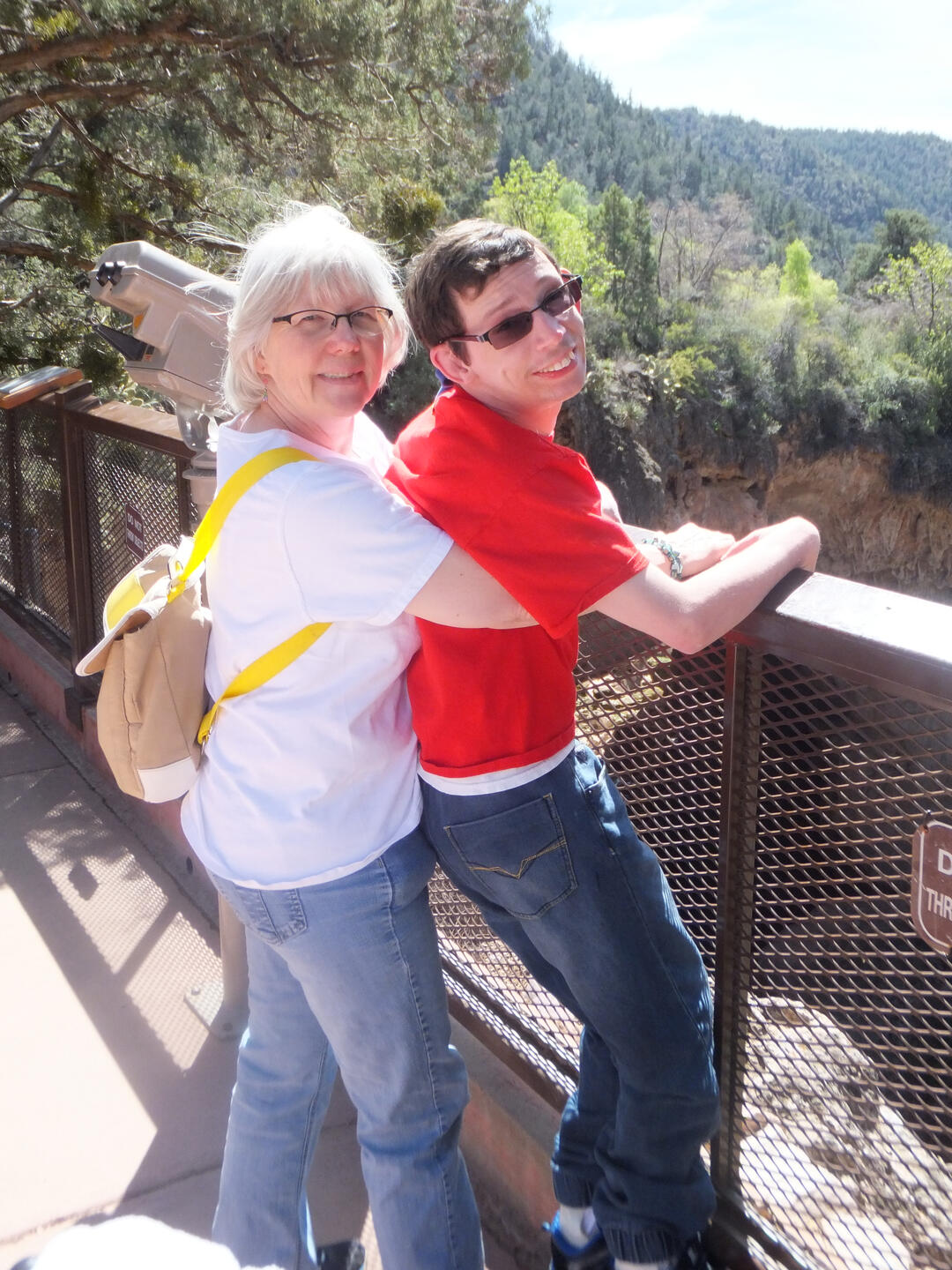 Barb holding Ryan at an overlook at Tonto Natural Bridge State Park